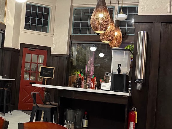 Woven pendant lights over the service counter at Basil Viet Kitchen
